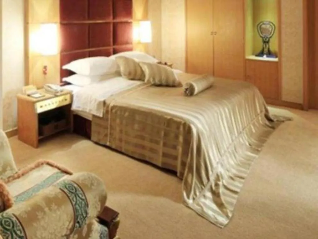 Bed in Economic Trade Hotel