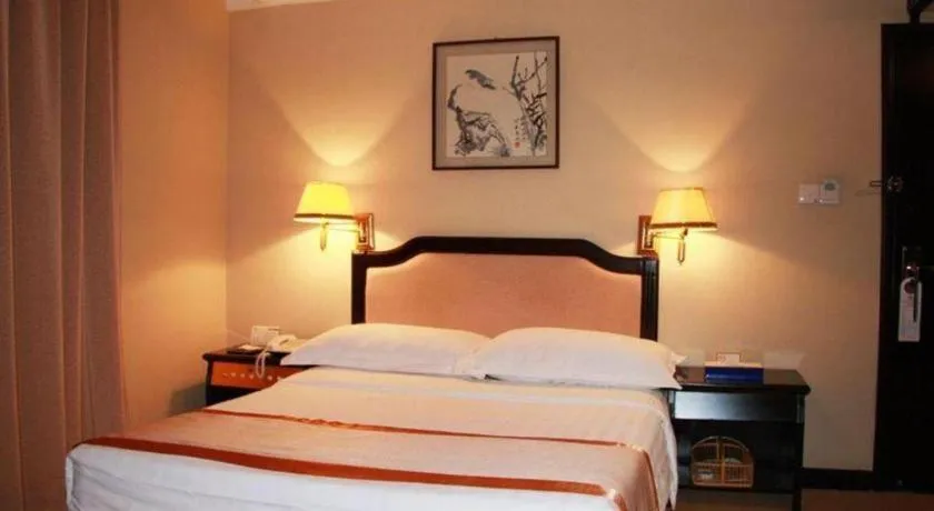 Bed in Economic Trade Hotel