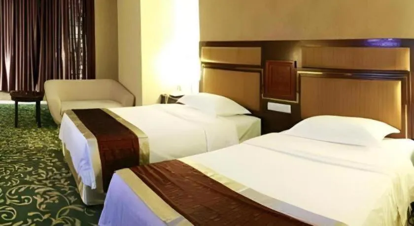 Bed in Economic Trade Hotel