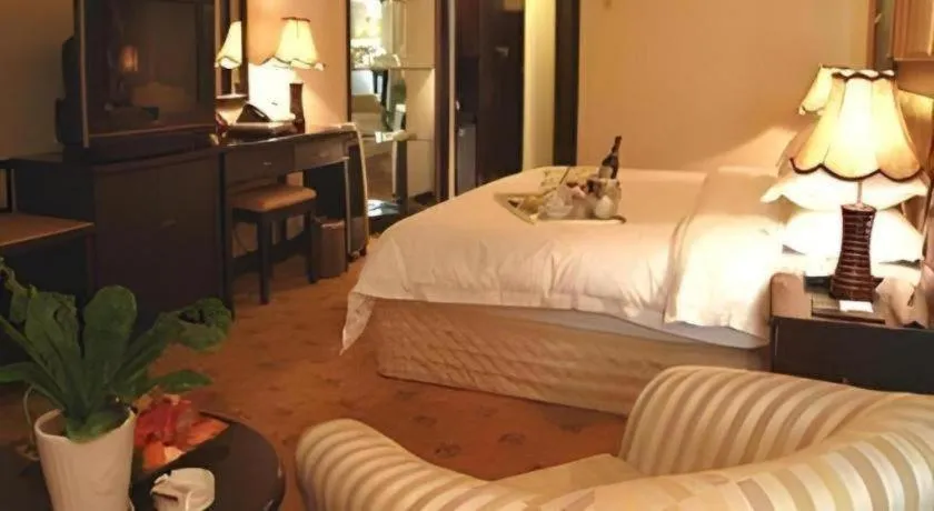 Bed in Economic Trade Hotel