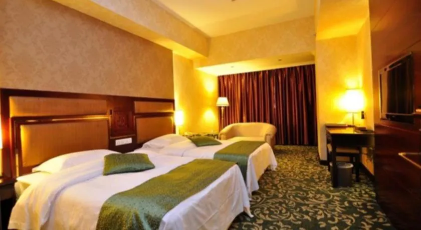 Bed in Economic Trade Hotel