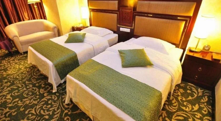 Bed in Economic Trade Hotel