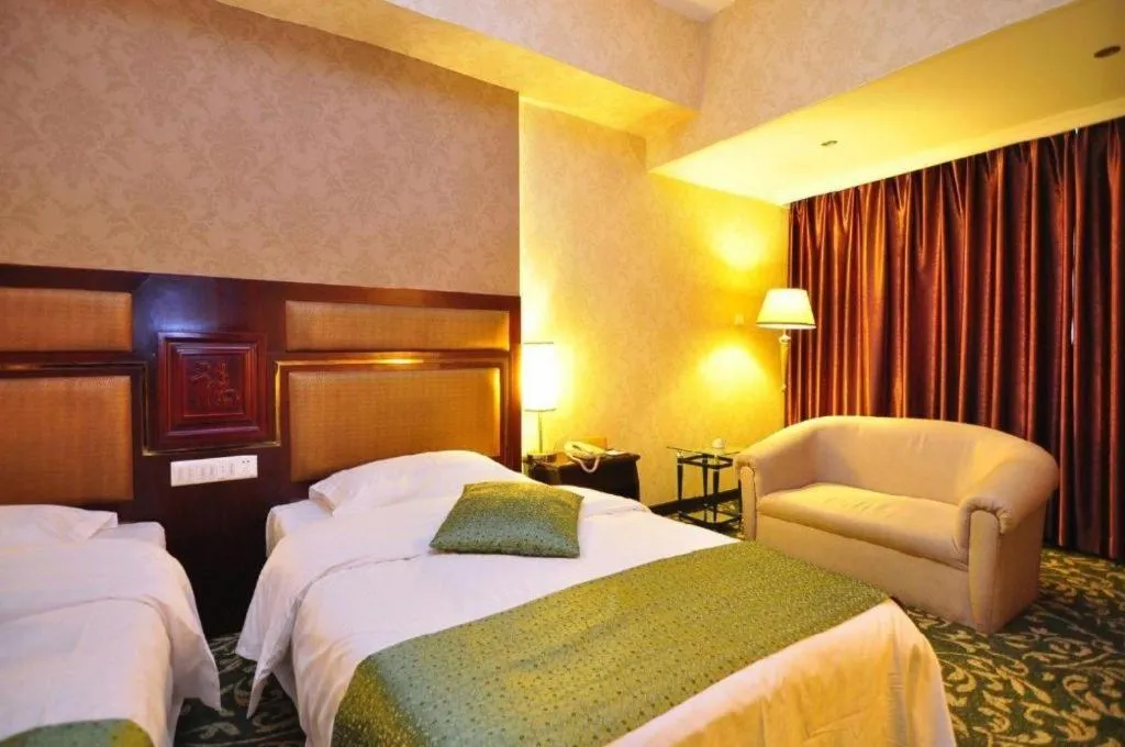 Bed in Economic Trade Hotel