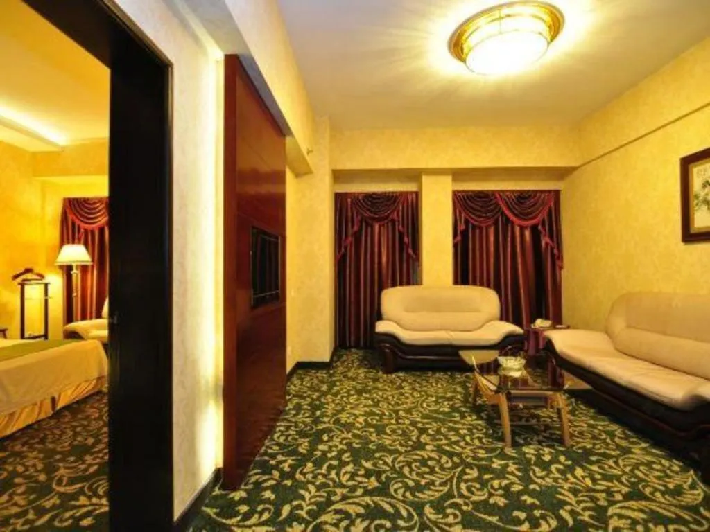 Bed in Economic Trade Hotel