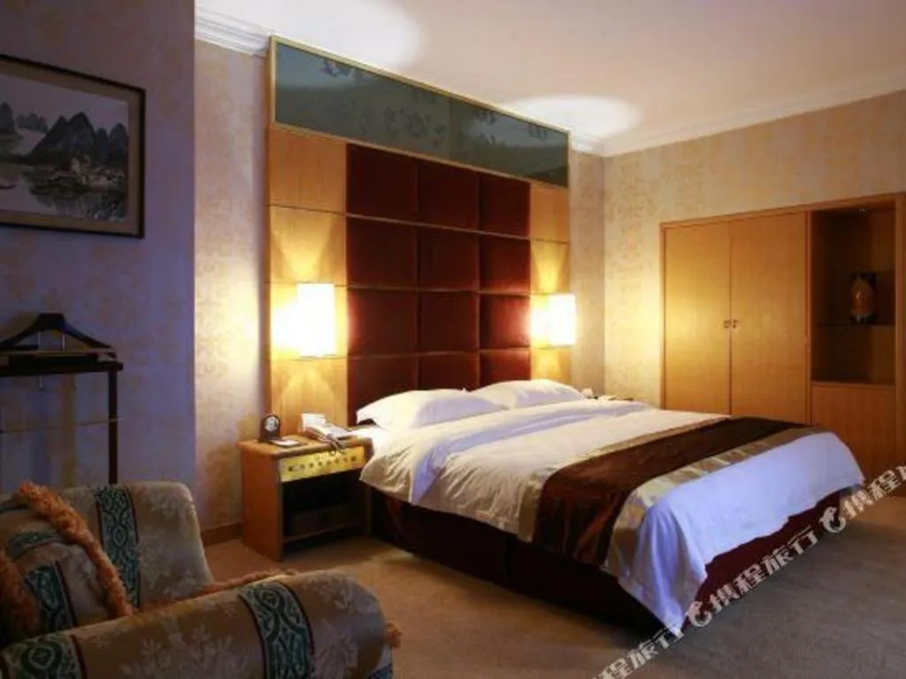 Bed in Economic Trade Hotel