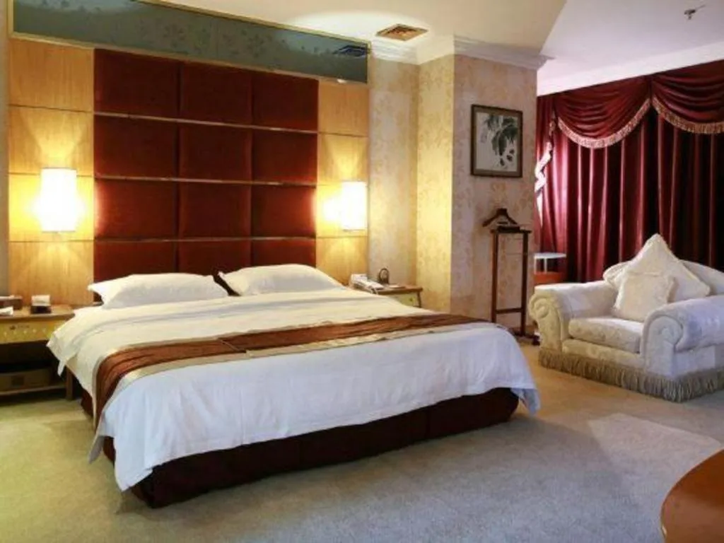 Bed in Economic Trade Hotel