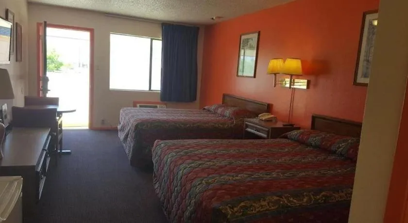 Bed in Regency Inn Breckenridge