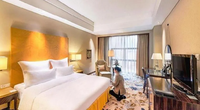 Bed in Kunshan Newport Hotel