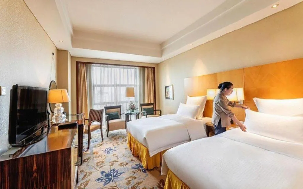 Bed in Kunshan Newport Hotel