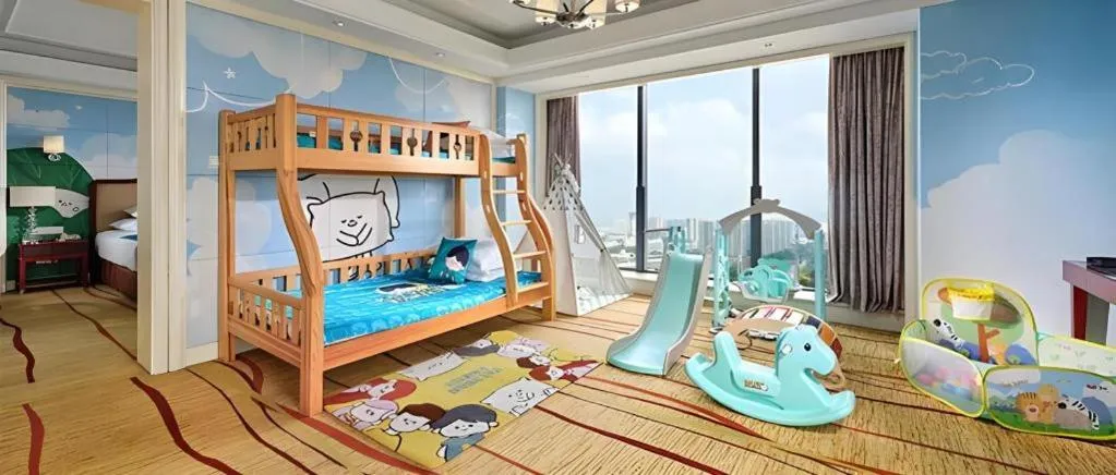 Bed in New Century Grand Hotel Zhejiang Sanli