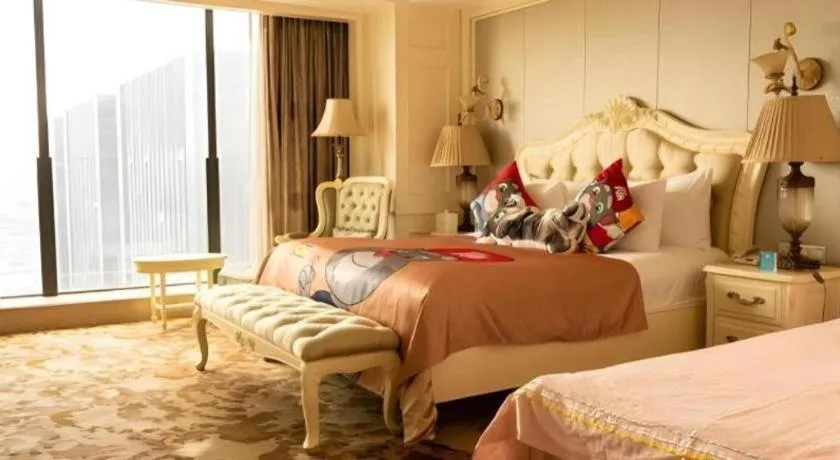 Bed in New Century Grand Hotel Zhejiang Sanli