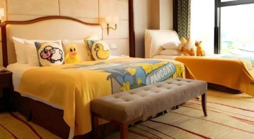 Bed in New Century Grand Hotel Zhejiang Sanli