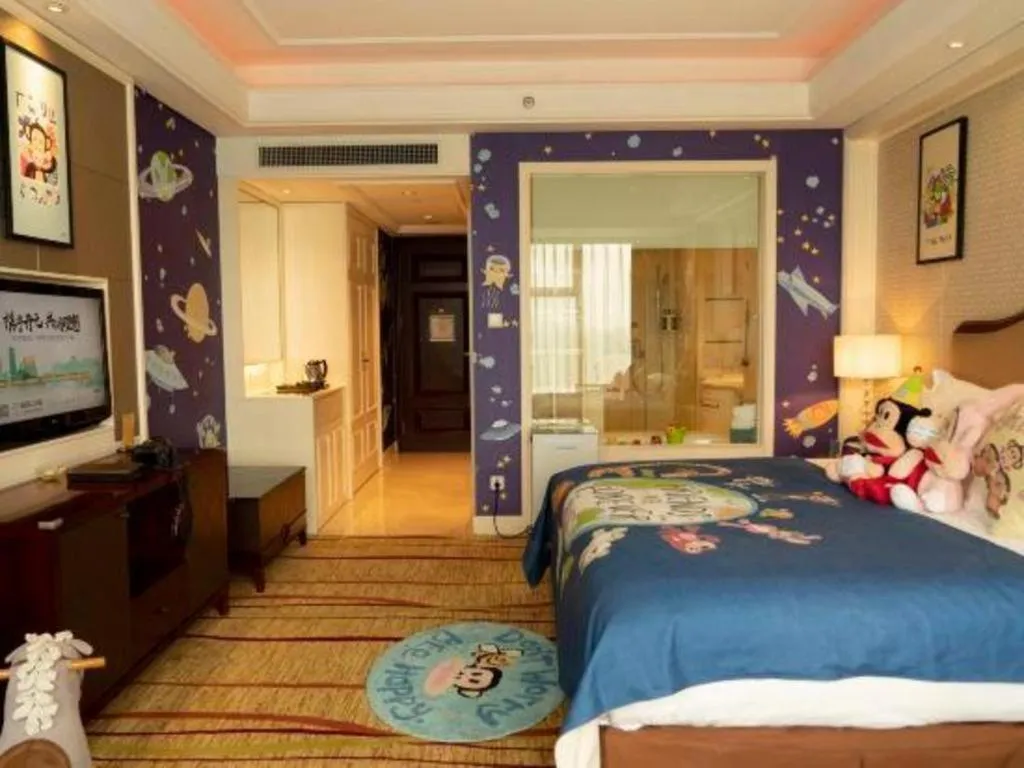 Bed in New Century Grand Hotel Zhejiang Sanli