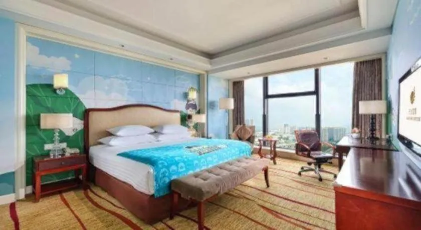 Bed in New Century Grand Hotel Zhejiang Sanli