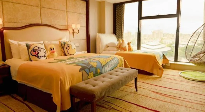 Bed in New Century Grand Hotel Zhejiang Sanli