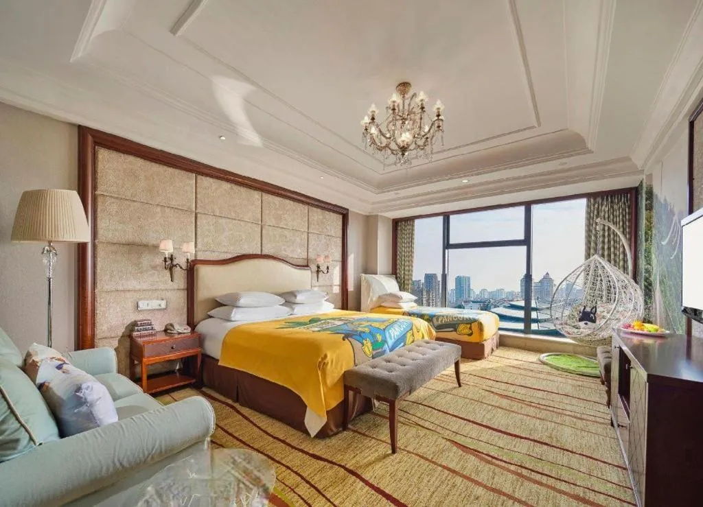 Bed in New Century Grand Hotel Zhejiang Sanli