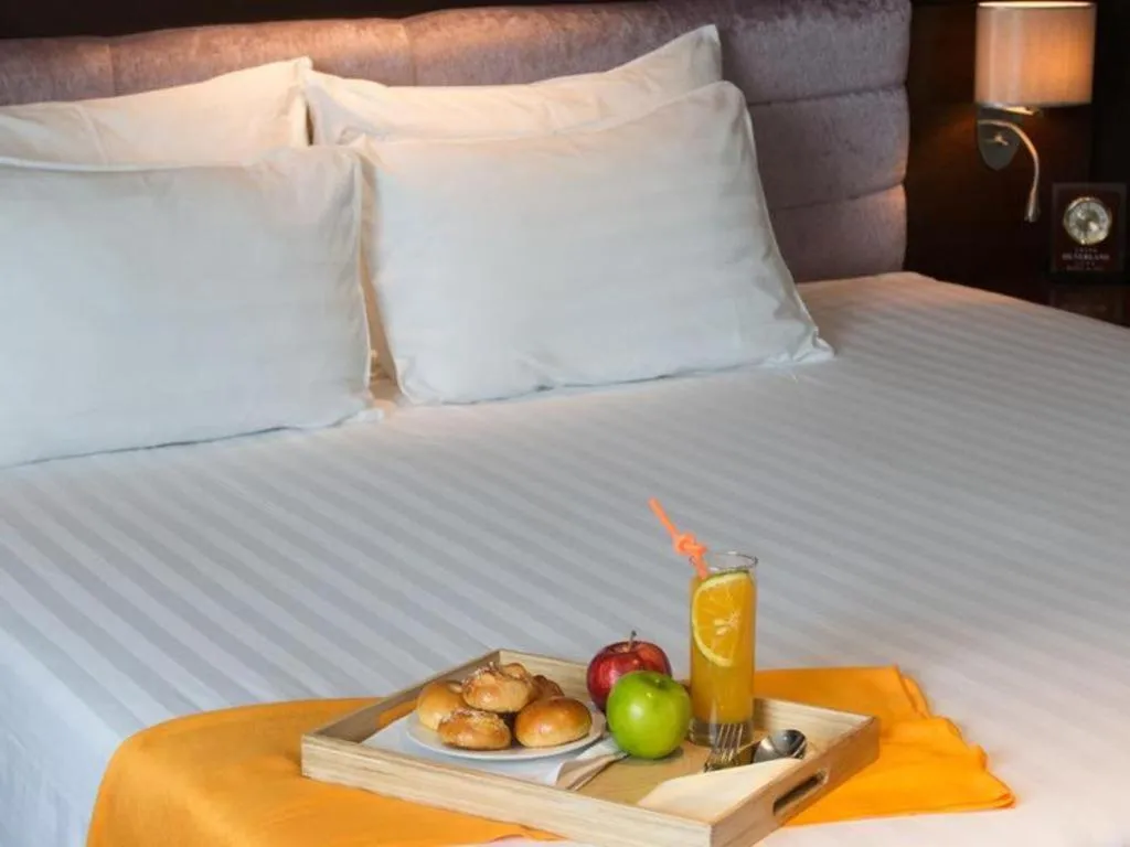 Bed in Grand Silverland Hotel