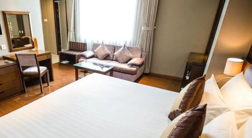 Bed in Grand Silverland Hotel