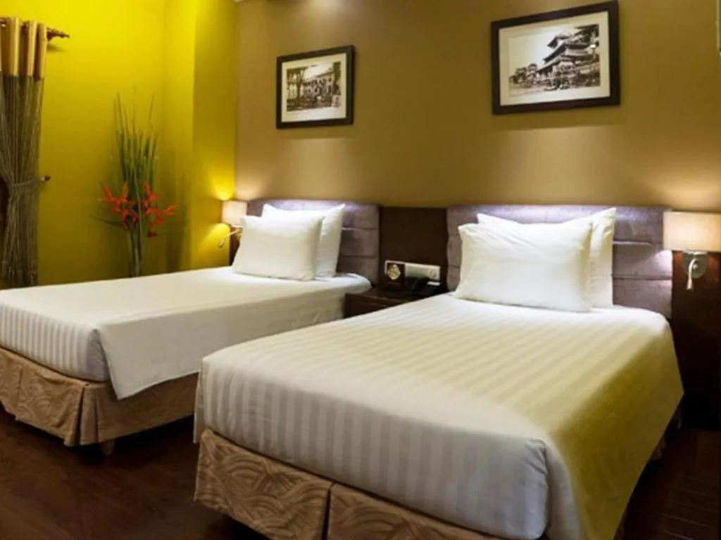 Bed in Grand Silverland Hotel