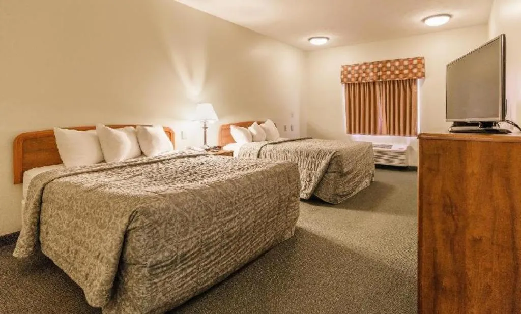 Bed in Supertel Inn And Conference Center