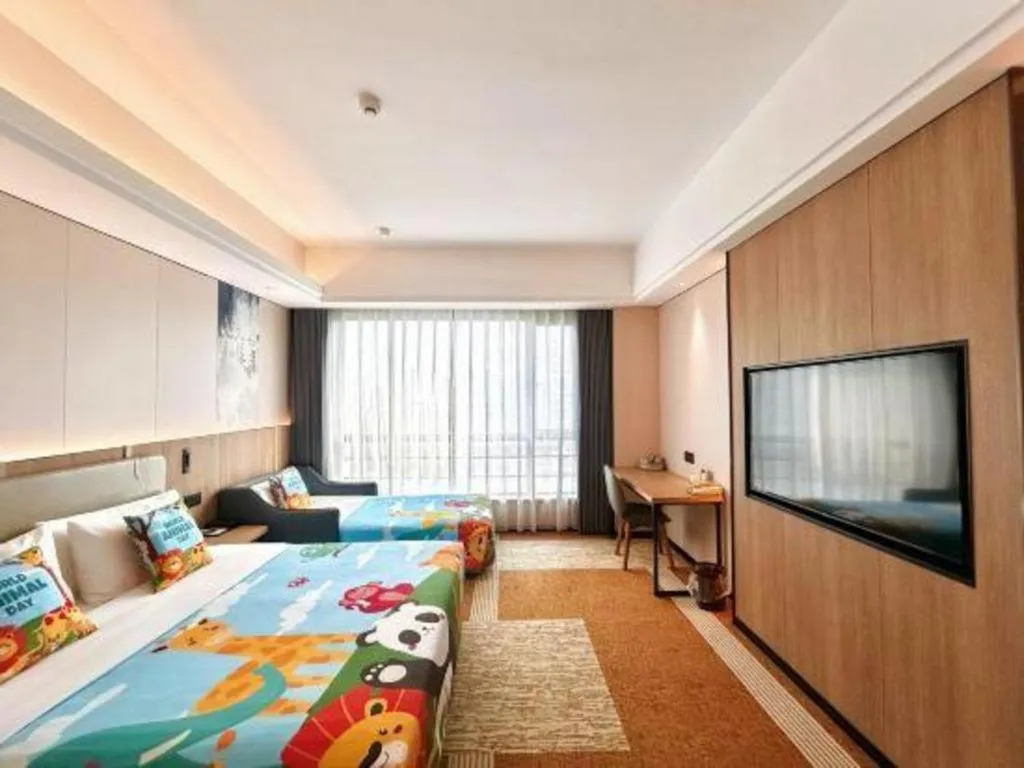 Bed in Jiaxing Fortune Holiday Hotel