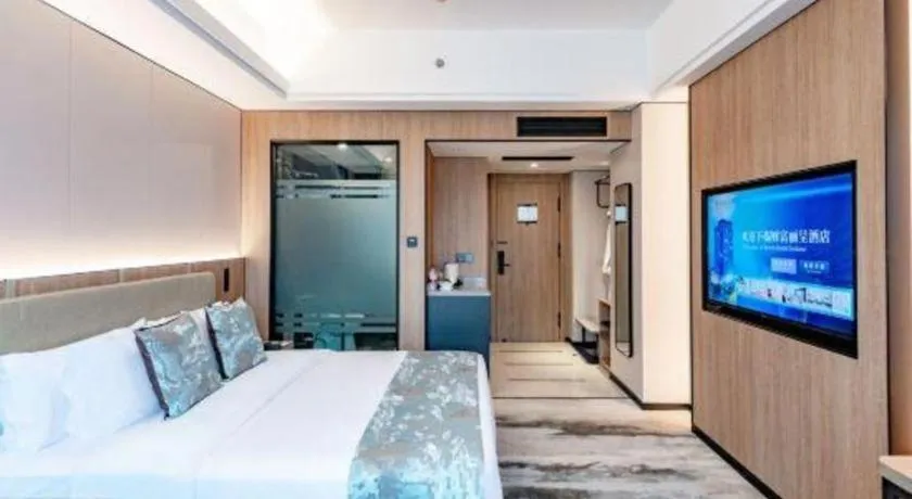 Bed in Jiaxing Fortune Holiday Hotel