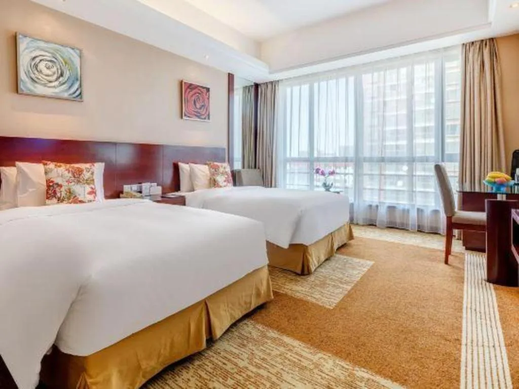 Bed in Jiaxing Fortune Holiday Hotel