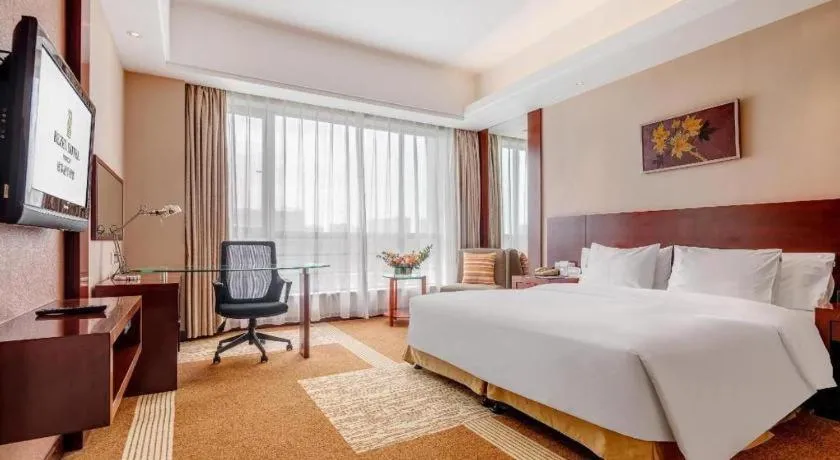 Bed in Jiaxing Fortune Holiday Hotel