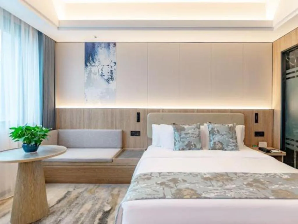 Bed in Jiaxing Fortune Holiday Hotel