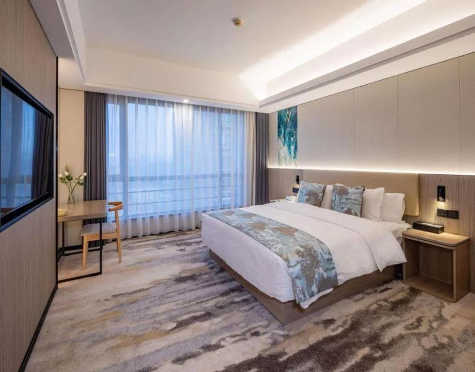 Bed in Jiaxing Fortune Holiday Hotel