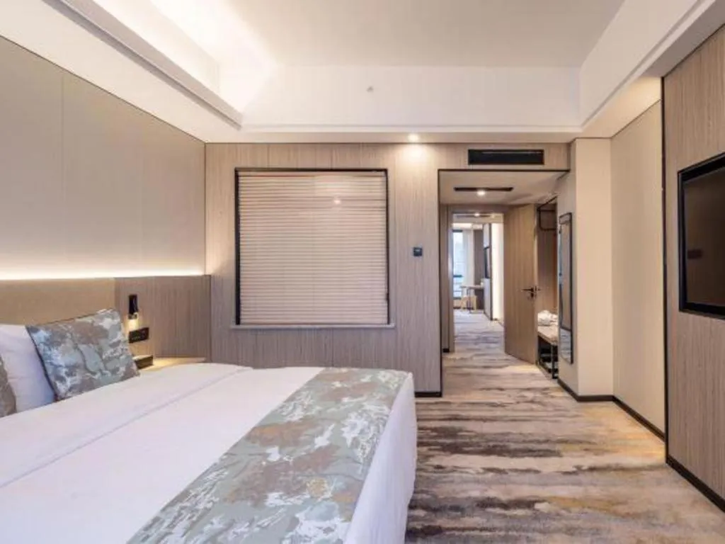 Bed in Jiaxing Fortune Holiday Hotel