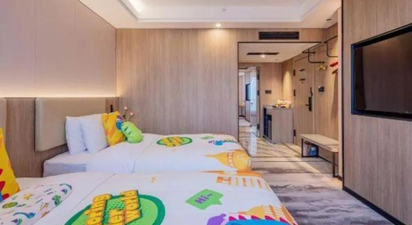 Bed in Jiaxing Fortune Holiday Hotel