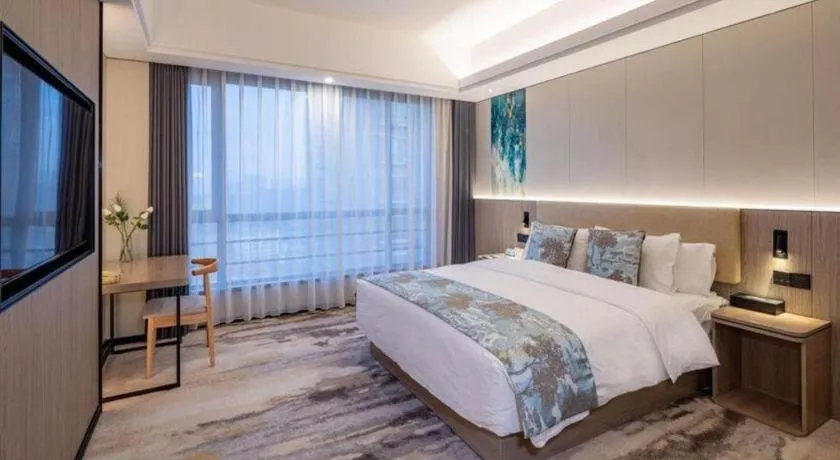 Bed in Jiaxing Fortune Holiday Hotel