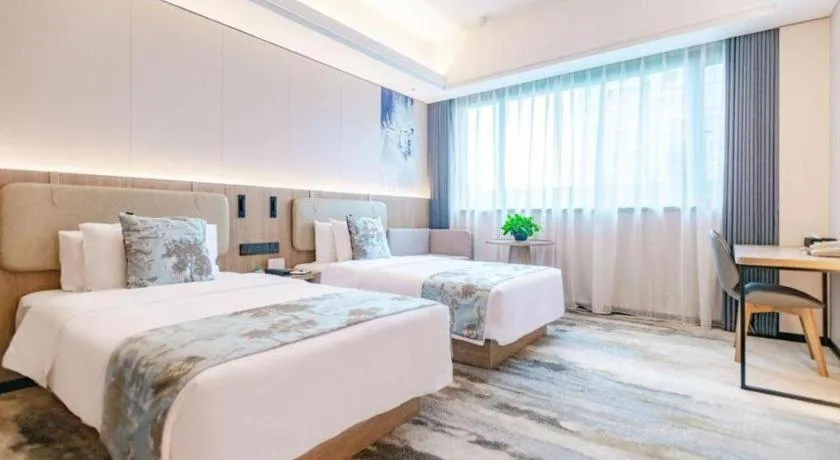 Bed in Jiaxing Fortune Holiday Hotel