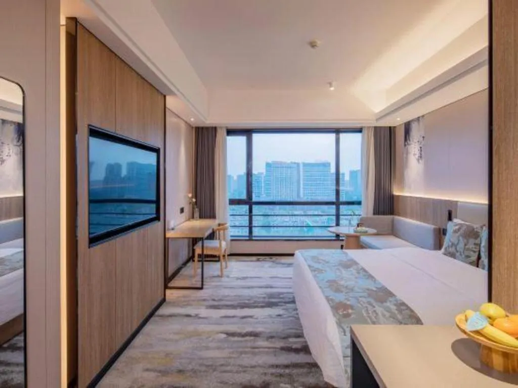 Bed in Jiaxing Fortune Holiday Hotel