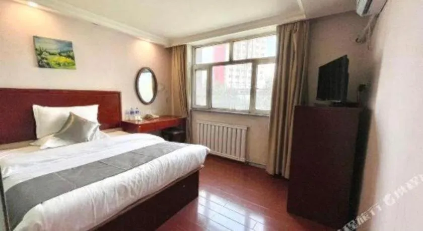 Bed in GreenTree Inn Urumqi South Xinhua Road Hotel
