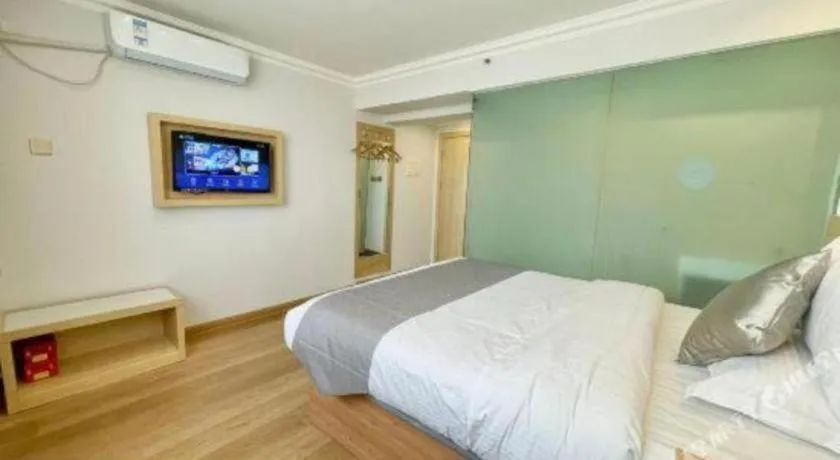 Bed in GreenTree Inn Urumqi South Xinhua Road Hotel