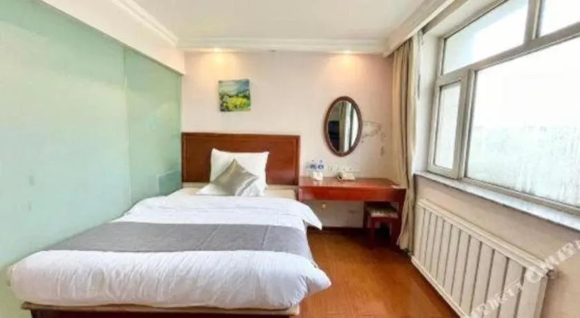 Bed in GreenTree Inn Urumqi South Xinhua Road Hotel