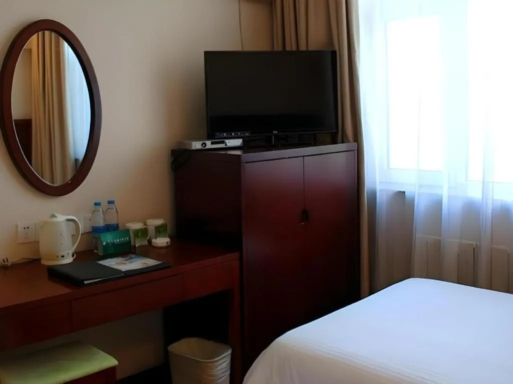 Bed in GreenTree Inn Urumqi South Xinhua Road Hotel