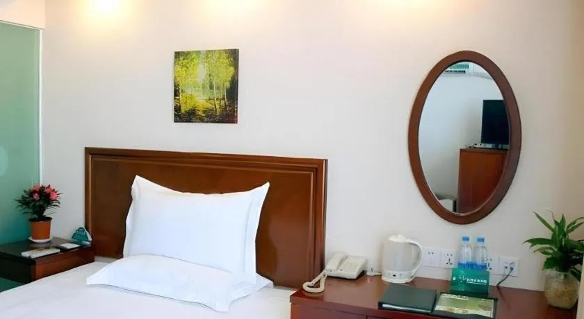 Bed in GreenTree Inn Urumqi South Xinhua Road Hotel