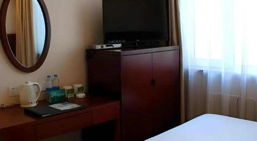 Bed in GreenTree Inn Urumqi South Xinhua Road Hotel