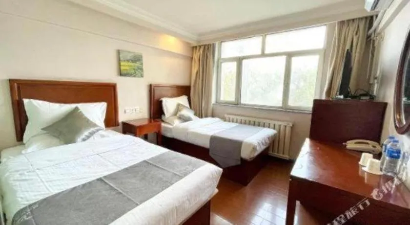 Bed in GreenTree Inn Urumqi South Xinhua Road Hotel