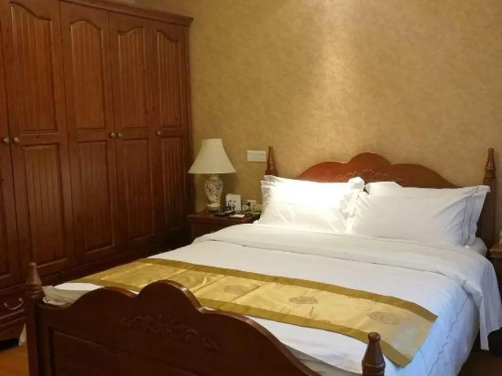 Bed in Chengdu Sovereign Hotel