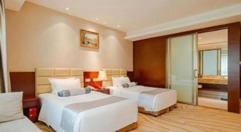 Bed in Chengdu Sovereign Hotel