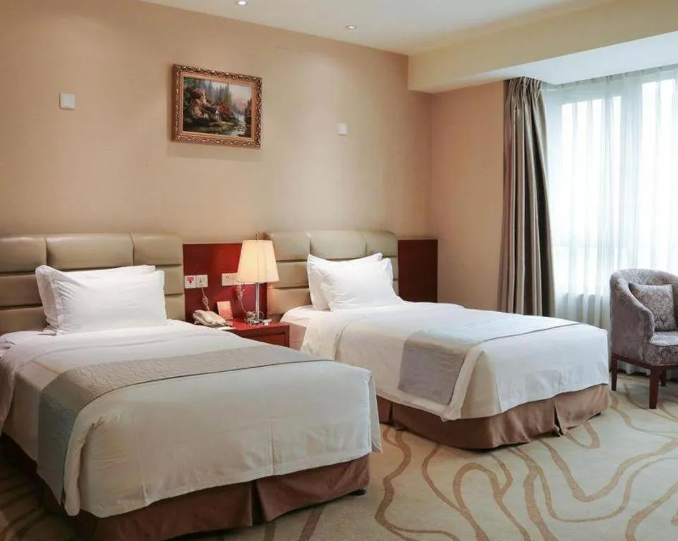 Bed in Chengdu Sovereign Hotel