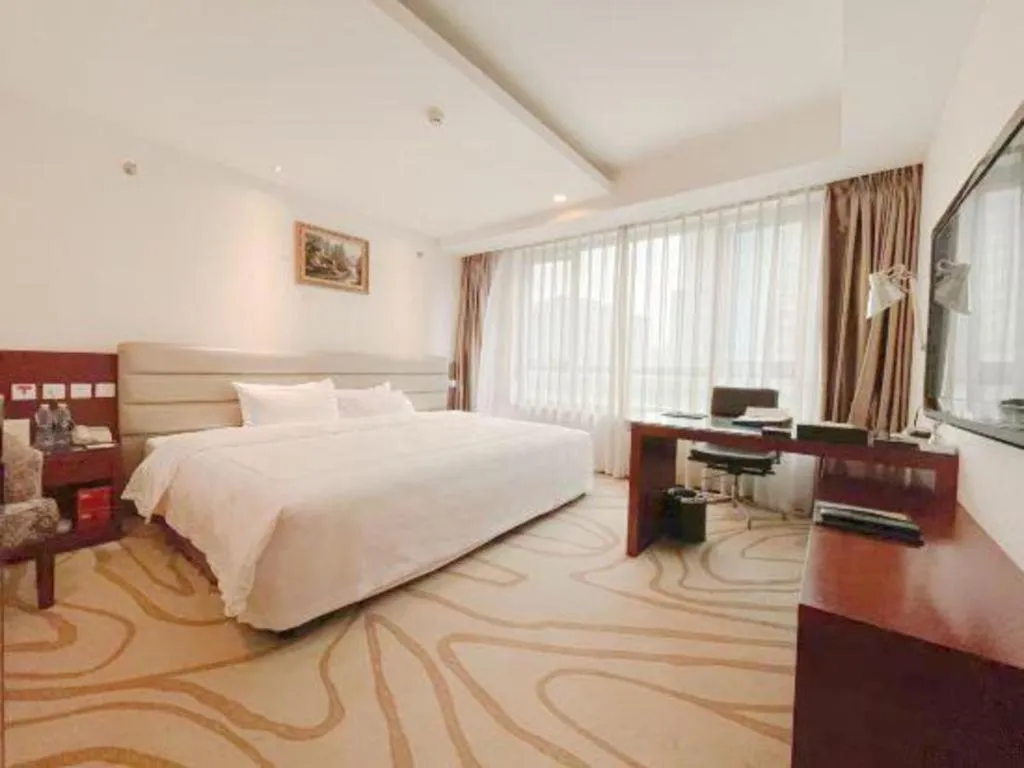 Bed in Chengdu Sovereign Hotel