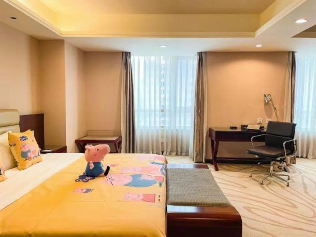 Bed in Chengdu Sovereign Hotel