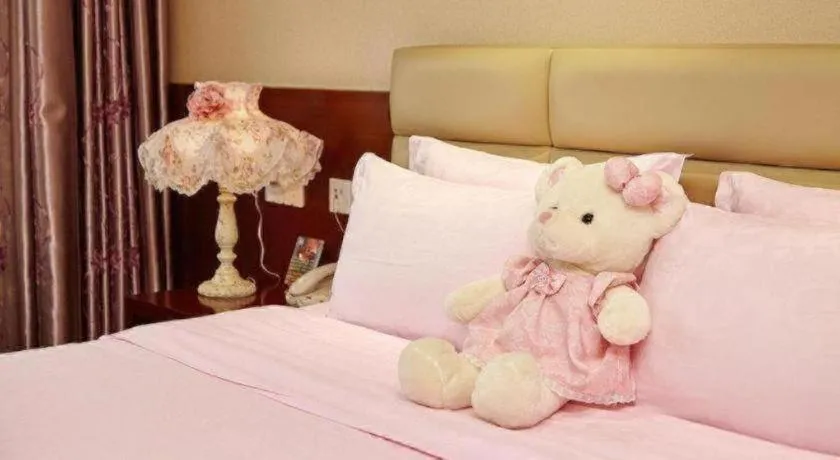 Bed in Chengdu Sovereign Hotel