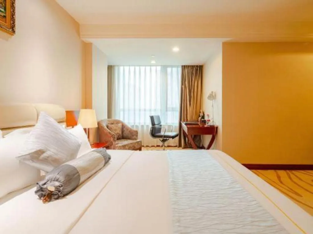 Bed in Chengdu Sovereign Hotel