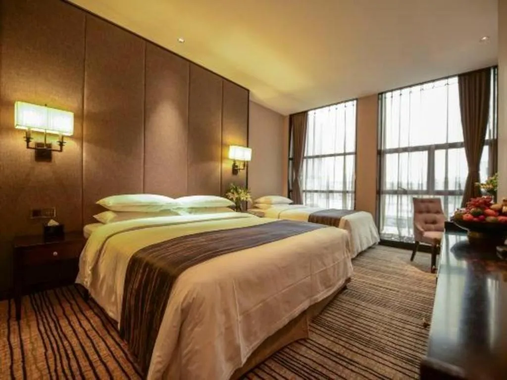 Bed in Green Westdon Hotel